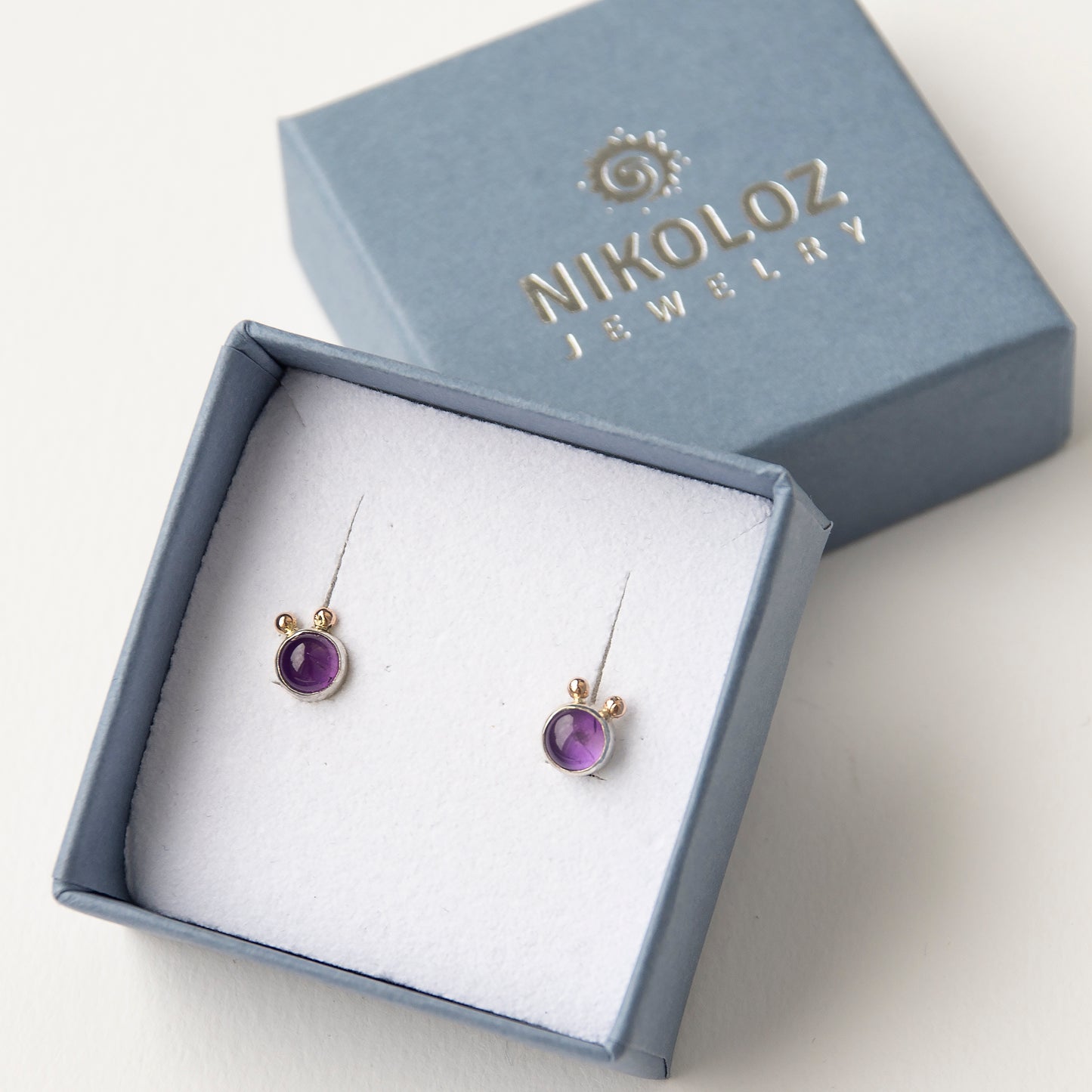 Amethyst Studs With 2 Gold Beads